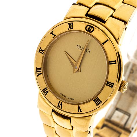 gold fashion gucci watch|Gucci watch gold detailing.